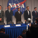 Micah Stock, Jake McDorman, Aaron Staton, Michael Trotter, Patrick J. Adams, Colin O’Donoghue, and James Lafferty in The Right Stuff